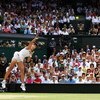 WIMBLEDON, ENGLAND - JULY 02:  Elena Dementieva of Russia serves during the women's singles semi final match against Serena Williams of USA on Day Ten of the Wimbledon Lawn Tennis Championships at the All England Lawn Tennis and Croquet Club on July 2, 20