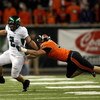 CORVALLIS, OR - NOVEMBER 29:  Quarterback Jeremiah Masoli #2  of the Oregon Ducks eludes the rush of Bryant Cornell #41 of the Oregon State Beavers at Reser Stadium on November 29, 2008 in Corvalis, Oregon.  (Photo by Jonathan Ferrey/Getty Images)