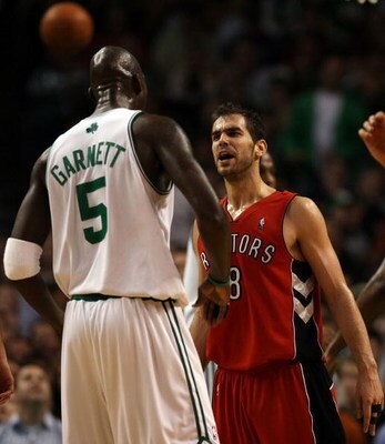 BOSTON - NOVEMBER 10:  Jose Calderon #8 of the Toronto Raptors and Kevin Garnett #5 of the Boston Celtics exchange words on November 10,  2008 at TD Banknorth Garden in Boston, Massachusetts. The Celtics defeated the Toronto Raptors 94-87.  NOTE TO USER: 