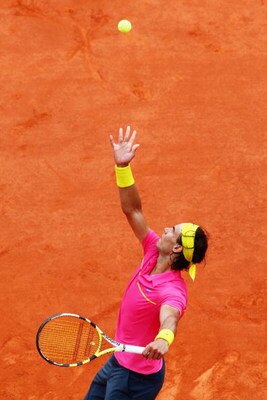 PARIS - MAY 31:  Rafael Nadal of Spain serves during the Men's Singles Fourth Round match against Robin Soderling of Sweden on day eight of the French Open at Roland Garros on May 31, 2009 in Paris, France.  (Photo by Ryan Pierse/Getty Images)