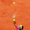 PARIS - MAY 31:  Rafael Nadal of Spain serves during the Men's Singles Fourth Round match against Robin Soderling of Sweden on day eight of the French Open at Roland Garros on May 31, 2009 in Paris, France.  (Photo by Ryan Pierse/Getty Images)