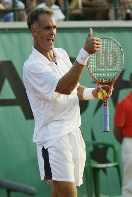 PARIS, FRANCE - MAY 29:  Tim Henman of Great Britain gets the thumbs up in his second round match against Todd Martin of the USA during the fourth day of the French Open on May 29, 2003 at Roland Garros in Paris, France. (Photo by Clive Brunskill/Getty Im