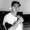 BOSTON - AUGUST 22, 1958:  (FILE PHOTO) Baseball legend Ted Williams (1918 - 2002) of the Boston Red Sox holds a baseball bat at Shriner's Day in Fenway Park August 22, 1958 in Boston, Massachusetts.  Alcor Life Extension Foundation, where Ted Williams' b
