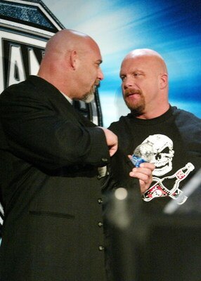 NEW YORK - MARCH 11: (L-R) Wrestlers Goldberg and Stone Cold Steve Austin attend a press conference to promote Wrestlemania XX at Planet Hollywood March 11, 2004 in New York City. (Photo by Peter Kramer/Getty Images)
