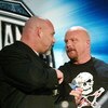 NEW YORK - MARCH 11:  (L-R) Wrestlers Goldberg and Stone Cold Steve Austin attend a press conference to promote Wrestlemania XX at Planet Hollywood March 11, 2004 in New York City.  (Photo by Peter Kramer/Getty Images)