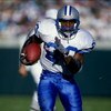 6 Dec 1998: Barry Sanders #20 of the Detroit Lions carries the ball during the game against the Jacksonville Jaguars at Alltel Stadium in Jacksonville, Florida. The Jaguars defeated the Lions 37-22.