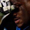 CHARLOTTE, NC - JANUARY 10:  Travelle Wharton #70 of the Carolina Panthers reacts while on the bench at the end of the fourth quarter of the game against the Arizona Cardinals during the NFC Divisional Playoff Game on January 10, 2009 at Bank of America S