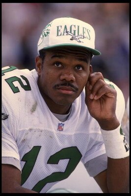 24 Sep 1995: Quarterback Randall Cunningham of the Philadelphia Eagles sits on the bench during the Eagles 48-17 loss to the Oakland Raiders at the Oakland Coliseum in Oakland, California.