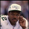 24 Sep 1995: Quarterback Randall Cunningham of the Philadelphia Eagles sits on the bench during the Eagles 48-17 loss to the Oakland Raiders at the Oakland Coliseum in Oakland, California.