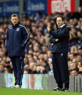 LIVERPOOL, UNITED KINGDOM - FEBRUARY 15:  Martin O'Neill (R) manager of Aston Villa and David Moyes manager of Everton look on from the touchline during the FA Cup Sponsored by e.on 5th Round match between Everton and Aston Villa at Goodison Park on Febru