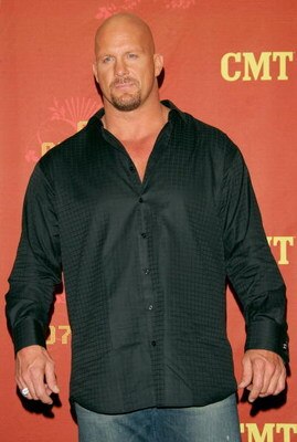 NASHVILLE, TN - APRIL 16:  Wrestler/Presenter Stone Cold Steve Austin poses for a photo in the press room at the 2007 CMT Music Awards at the Curb Event Center at Belmont University April 16, 2007 in Nashville, Tennessee.  (Photo by Evan Agostini/Getty Im