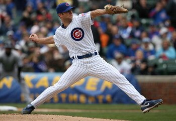 CHICAGO - APRIL 15: Starting pitcher Rich Harden of the Chicago Cubs, wearing a #42 jersey during the Jackie Robinson Day game, delivers the ball against the Colorado Rockies on April 15, 2009 at Wrigley Field in Chicago, Illinois. (Photo by Jonathan Dani