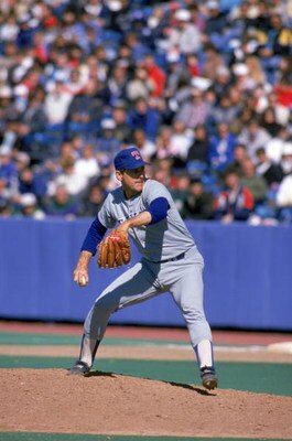 TORONTO - 1989:  Nolan Ryan #34 of the Texas Rangers pitches during the 1989 season against the Toronto Blue Jays at Skydome in Toronto, Ontario, Canada.  (Photo by Rick Stewart/Getty Images)