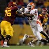 MINNEAPOLIS, MN - NOVEMBER 03:  Guard Dominic Alford #76 of the Minnesota Golden Gophers blocks defensive end Jerry Brown #99 of the Illinois Fighting Illini at the Hubert H. Humphrey Metrodome on November 3, 2007 in Minneapolis, Minnesota. Illinois defea