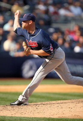 NEW YORK - APRIL 19:  Kerry Wood #34 of the Cleveland Indians pitches against the New York Yankees at Yankee Stadium on April 19, 2009 in the Bronx borough of New York City.  (Photo by Ezra Shaw/Getty Images)