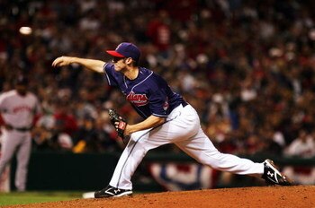 CLEVELAND - OCTOBER 16:  Jensen Lewis #50 of the Cleveland Indians pitches against the Boston Red Sox during Game Four of the American League Championship Series at Jacobs Field on October 16, 2007 in Cleveland, Ohio.  (Photo by Jim McIsaac/Getty Images)