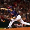 CLEVELAND - OCTOBER 16:  Jensen Lewis #50 of the Cleveland Indians pitches against the Boston Red Sox during Game Four of the American League Championship Series at Jacobs Field on October 16, 2007 in Cleveland, Ohio.  (Photo by Jim McIsaac/Getty Images)