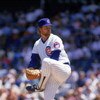 CHICAGO - 1987:  Rick Sutcliffe #40 of the Chicago Cubs winds back to pitch during a game in the 1987 season at Wrigley Field in Chicago, Illinois . ( Photo by: Jonathan Daniel/ Getty Images )