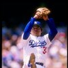 Pitcher Fernando Valenzuela of the Los Angeles Dodgers prepares to throw the ball during a game against the Houston Astros at Dodger Stadium in Los Angeles, California.