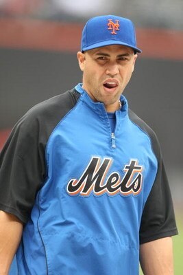 NEW YORK - JUNE 10:  Carlos Beltran #15 of the New York Mets looks on during batting practice before the game against the Philadelphia Phillies during their game on June 10, 2009 at Citi Field in the Flushing neighborhood of the Queens borough of New York