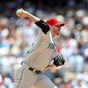 NEW YORK - JULY 04:  Roy Halladay #32 of the Toronto Blue Jays pitches against the New York Yankees on July 4, 2009 at Yankee Stadium in the Bronx borough of New York City.  (Photo by Nick Laham/Getty Images)