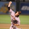 OAKLAND, CA - JUNE 23:  Tim Lincecum #55 of the San Francisco Giants pitches against the Oakland Athletics during a Major League Baseball game on June 23, 2009 at the Oakland Coliseum in Oakland, California.  (Photo by Jed Jacobsohn/Getty Images)