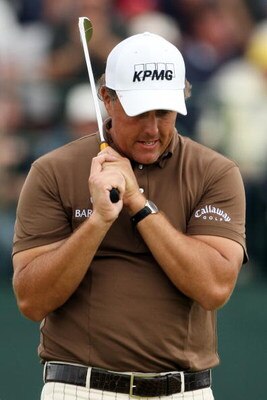 FARMINGDALE, NY - JUNE 22:  Phil Mickelson reacts to a missed putt on the 18th green during the continuation of the final round of the 109th U.S. Open on the Black Course at Bethpage State Park on June 22, 2009 in Farmingdale, New York.  (Photo by Andrew 