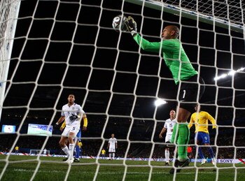 JOHANNESBURG, SOUTH AFRICA - JUNE 28:  Tim Howard of USA saves a header from Kaka of Brazil on the line during the FIFA Confederations Cup Final between USA and Brazil at the Ellis Park Stadium on June 28, 2009 in Johannesburg, South Africa.  (Photo by Al