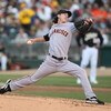OAKLAND, CA - JUNE 23:  Tim Lincecum #55 of the San Francisco Giants pitches against the Oakland Athletics during a Major League Baseball game on June 23, 2009 at the Oakland Coliseum in Oakland, California.  (Photo by Jed Jacobsohn/Getty Images)