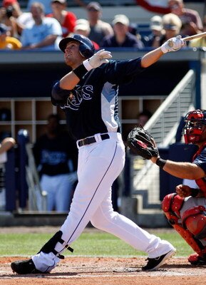 PORT CHARLOTTE, FL - FEBRUARY 27:  Infielder Evan Longoria #3 of the Tampa Bay Rays watches his home run against the Boston Red Sox during a Grapefruit League Spring Training Game at Charlotte Sports Park on February 27, 2009 in Port Charlotte, Florida.  