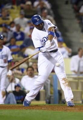 LOS ANGELES, CA - JUNE 16:  Matt Kemp #27 of the Los Angeles Dodgers hits a base hit scoring the game winning run in the tenth inning against the Oakland Athletics at Dodger Stadium on June 16, 2009 in Los Angeles, California. The Dodgers defeated the Ath