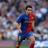 MADRID, SPAIN - MAY 02:  Xavi Hernandez of Barcelona runs with the ball during the La Liga match between Real Madrid and Barcelona at the Santiago Bernabeu Stadium on May 2, 2009 in Madrid, Spain. Barcelona won the match 6-2.  (Photo by Jasper Juinen/Gett