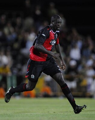 VILA REAL DE SANTO ANTONIO, PORTUGAL - JULY 26: Christopher Samba of Blackburn Rovers runs during the Guadiana Tournament match between Blackburn Rovers and Sporting Lisbon at the Vila Real De Santo Antonio stadium on July 26, 2008 in Vila Real De Santo A