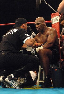 WASHINGTON - JUNE 11:  Mike Tyson receives instructions in his corner during his heavyweight bout against Kevin McBride at the MCI Center June 11, 2005 in Washington, DC.  (Photo by Mitchell Layton/Getty Images)