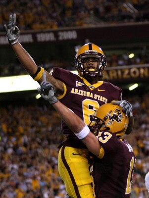 TEMPE, AZ - OCTOBER 13:  Wide receiver Kyle Williams #6 of the Arizona State Sun Devils celebrates with Chris McCabe #13 after Williams' three yard touchdown reception against the Washington Huskies at Sun Devil Stadium October 13, 2007 in Tempe, Arizona.