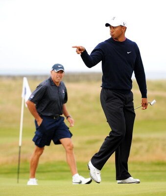 TURNBERRY, SCOTLAND - JULY 13: Tiger Woods of the USA with his caddie Steve Williams on the 15th green during the practice round of the 138th Open Championship on July 13, 2009 on the Ailsa Course, Turnberry Golf Club, Turnberry, Scotland. (Photo by Harry