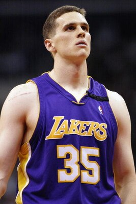 LOS ANGELES - MARCH 17:  Mark Madsen #35 of the Los Angeles Lakers looks on during the game against the Los Angeles Clippers at Staples Center on March 17, 2003 in Los Angeles, California.  The Lakers won 102-85.  NOTE TO USER: User expressly acknowledges