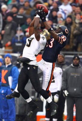 CHICAGO - JANUARY 21:  Devery Henderson #19 of the New Orleans Saints makes a 40-yard reception in the first quarter against Charles Tillman #33 of the Chicago Bears during the NFC Championship Game January 21, 2007 at Soldier Field in Chicago, Illinois. 