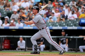 DENVER - JULY 12:  Chipper Jones #10 of the Atlanta Braves takes an at bat against the Colorado Rockies during MLB action at Coors Field on July 12, 2009 in Denver, Colorado. The Rockies defeated the Braves 8-7.  (Photo by Doug Pensinger/Getty Images)