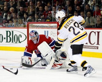 MONTREAL- APRIL 22:  Carey Price #31 of the Montreal Canadiens stops the puck on a shot by Mark Recchi #28 of the Boston Bruins during Game Four of the Eastern Conference Quarterfinals of the 2009 Stanley Cup Playoffs at the Bell Centre on April 22, 2009 