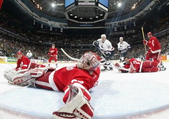 21 Apr 2002:  Goaltender Dominik Hasek #39 of the Detroit Red Wings makes a save during the third period of game three of the NHL Western Conference Quarterfinal series against the Vancouver Canucks at General Motors Place in Vancouver, Canada. Detroit de