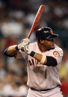 PHOENIX - JUNE 11:  Juan Uribe #5 of the San Francisco Giants at bat during the major league baseball game against the Arizona Diamondbacks at Chase Field on June 11, 2009 in Phoenix, Arizona.  The Diamondbacks defeated the Giants 2-1.  (Photo by Christia