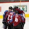DENVER - JANUARY 18:  Milan Hejduk #23 of the Colorado Avalanche is congratulated by his teammates Wojtek Wolski #8, John-Michael Liles #4 and Ryan Smyth #94 after scoring his 300th NHL career goal on goaltender Curtis McElhinney of the Calgary Flames in 