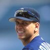 30 Sep 2000:  Alex Rodriguez #3 of the Seattle Mariners reacts to a teammates joke during their game against the Anaheim Angels at Edison Field in Anaheim, California. The Mariners defeated the Angels 21-9. Mandatory Credit: Jeff Gross/ALLSPORT