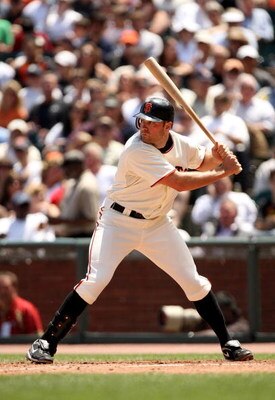 SAN FRANCISCO - JUNE 17:  Nate Schierholtz #12 of the San Francisco Giants bats against the Los Angeles Angels of Anaheim at AT&T Park on June 17, 2009 in San Francisco, California.  (Photo by Ezra Shaw/Getty Images)