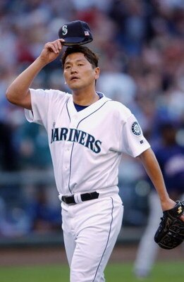 SEATTLE - MAY 25:  Kazuhiro Sasaki#22 of the Seattle Mariners walks on the field during the game aganist the Minnesota Twins on May 25, 2003 at Safeco Field in Seattle, Washington.  The Twins defeated the Mariners 3-1. (Photo by Otto Greule Jr./Getty Imag