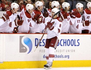 GLENDALE, AZ - APRIL 02:  Scottie Upshall #8 of the Phoenix Coyotes celebrates with teammates after scoring a third period goal against the Los Angeles Kings during the NHL game at Jobing.com Arena on April 2, 2009 in Glendale, Arizona. The Coyotes defeat