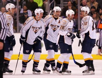 LOS ANGELES, CA - MARCH 16:  Steve Sullivan #26 of the Nashville Predators laughs as his teammates look on after Sullivan scored a goal in the second period against the Los Angeles Kings during the NHL game at Staples Center on March 16, 2009 in Los Angel
