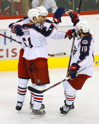 ST. PAUL, MN - OCTOBER 25:  Rostislav Klesla #97, Fedor Tyutin #51 and Michael Peca #19 of the Columbus Blue Jackets celebrate after Klesla's goal in the third period October 25, 2008 at the Xcel Energy Center in St. Paul, Minnesota. Minnesota won, 2-1. (
