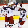 ST. PAUL, MN - OCTOBER 25:  Rostislav Klesla #97, Fedor Tyutin #51 and Michael Peca #19 of the Columbus Blue Jackets celebrate after Klesla's goal in the third period October 25, 2008 at the Xcel Energy Center in St. Paul, Minnesota. Minnesota won, 2-1. (